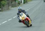 Andrew Marsden approaching Sulby Bridge.