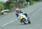 Patrick Van Gils approaching Sulby Bridge.