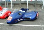 Bill Currie/Philip Bridge's sidecar at the TT Grandstand, Douglas.