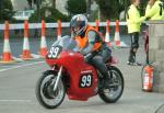 Chris Howitt (99) during practice, leaving the Grandstand, Douglas.