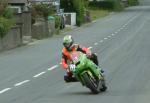 Fabienne Migout approaching Sulby Bridge.