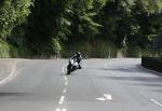 Daniel Kneen approaching Braddan Bridge.