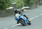 Andy Wallace approaching Sulby Bridge.