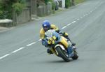 Alan Connor approaching Sulby Bridge.