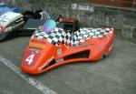 Roy Hanks/David Wells' side car at the TT Grandstand, Douglas.