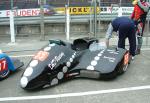Trevor Tullett/Lisel Marie Amos's sidecar at the TT Grandstand, Douglas.