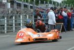 Jef Driesen/Barry Pepperrell at the TT Grandstand, Douglas.