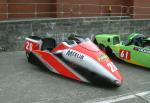 Howard Baker/Nigel Barlow's sidecar at the TT Grandstand, Douglas.