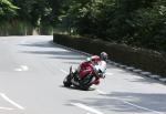 Conor Cummins approaching Braddan Bridge.