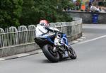 Rodger Wibberley approaching Braddan Bridge.