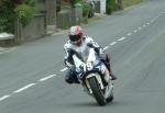 Roger Meads approaching Sulby Bridge.