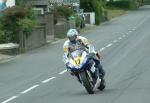 Martin Finnegan approaching Sulby Bridge.