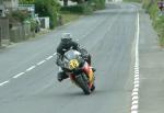 Peter Hounsell approaching Sulby Bridge.