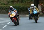 Chris Wedgwood (number 19) on Braddan Bridge, Douglas.