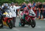 Ryan Farquhar (number 6) leaving TT Grandstand.