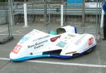 Gregory Lambert/Ivan Murray's sidecar at the TT Grandstand, Douglas.