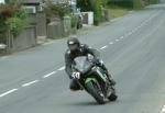 Scott Stewart approaching Sulby Bridge.