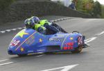 Simon Neary/Stuart Bond at Signpost Corner, Onchan.