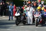 Ian Armstrong (13) at the TT Grandstand, Douglas.