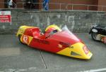 Robert Verrier/Ian Conn's sidecar at the TT Grandstand, Douglas.