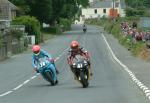 Tom Clucas approaching Sulby Bridge.