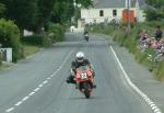 Alex Donaldson approaching Sulby Bridge.