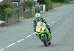 Richard Britton approaching Sulby Bridge.