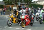 Carl Hildige (99) during practice, leaving the Grandstand, Douglas.