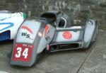 Wally Saunders/Bruce Moore's sidecar at the TT Grandstand, Douglas.