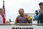 Steven Linsdell on the winners podium at the TT Grandstand.