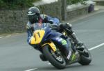 George Spence approaching Sulby Bridge.