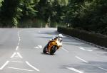 Chris Palmer approaching Braddan Bridge.