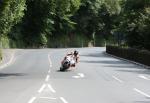 Ian Hutchinson approaching Braddan Bridge.