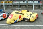 Jean-Claud Kestler/Christophe Vergne's sidecar at the TT Grandstand, Douglas.