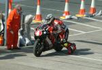 John McGuinness pushes into the pits, Douglas.