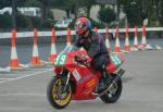 Carl Hildige during practice, leaving the Grandstand, Douglas.